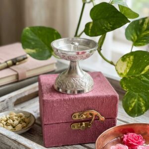 silver diya with beautiful design